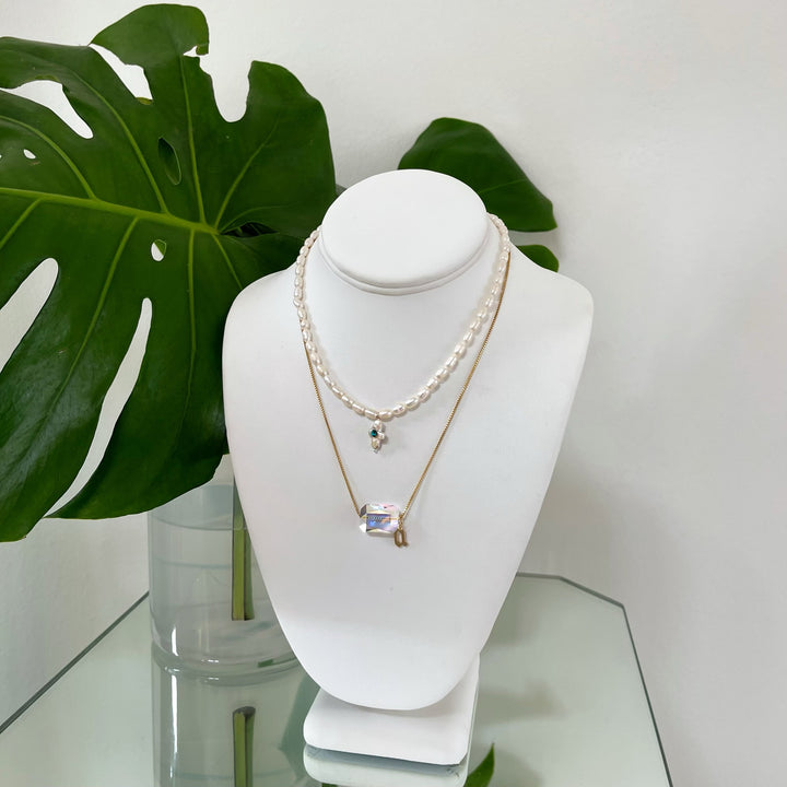 PETITE CROSS MELT PEARL NECKLACE