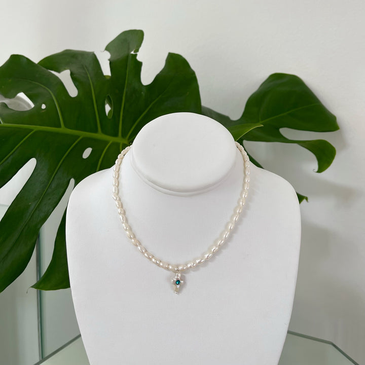 PETITE CROSS MELT PEARL NECKLACE